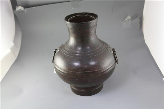 A Chinese bronze wine vessel, Hu, Han dynasty, height 43.5cm